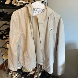 Beige Hooded rain/running new balance jacket